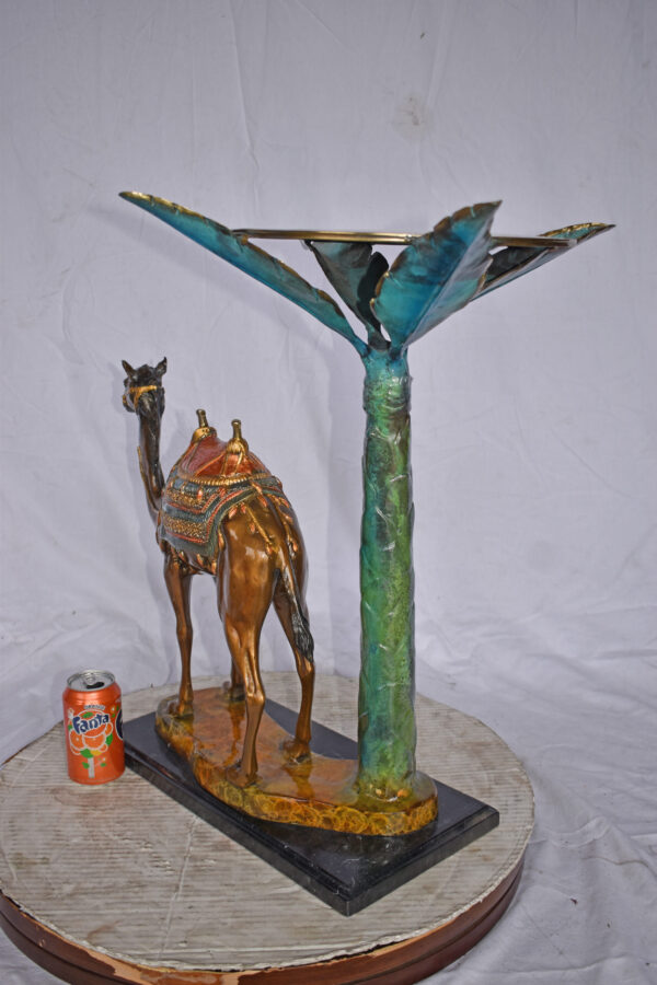 Camel Standing Under A Palm Tree Bronze Statue - Size: 20"L x 29"W x 25"H. - Image 4