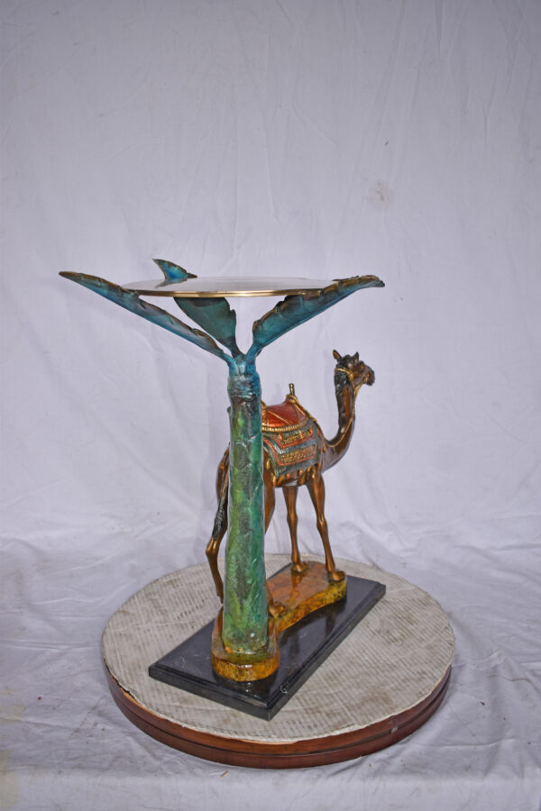 Camel Standing Under A Palm Tree Bronze Statue - Size: 20"L x 29"W x 25"H. - Image 6