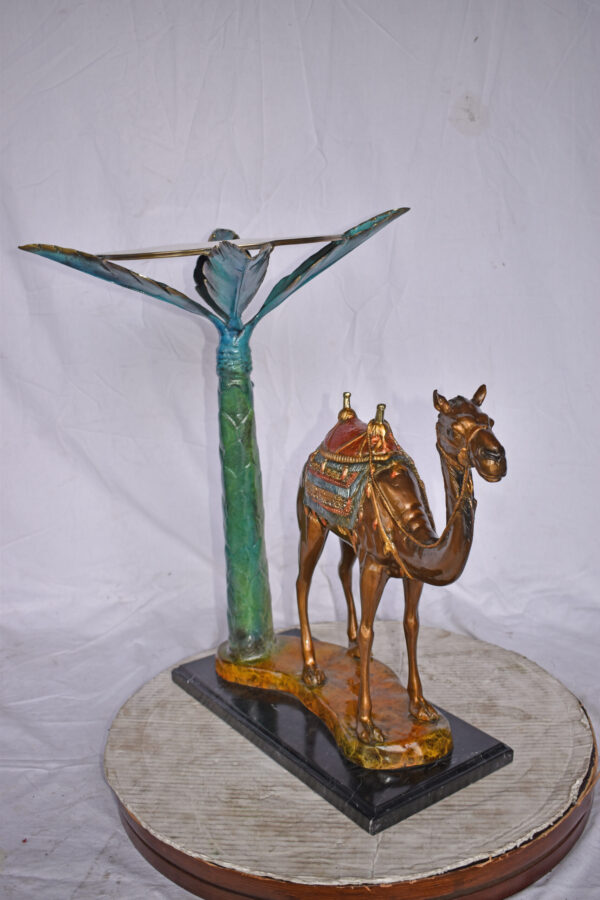 Camel Standing Under A Palm Tree Bronze Statue - Size: 20"L x 29"W x 25"H. - Image 9