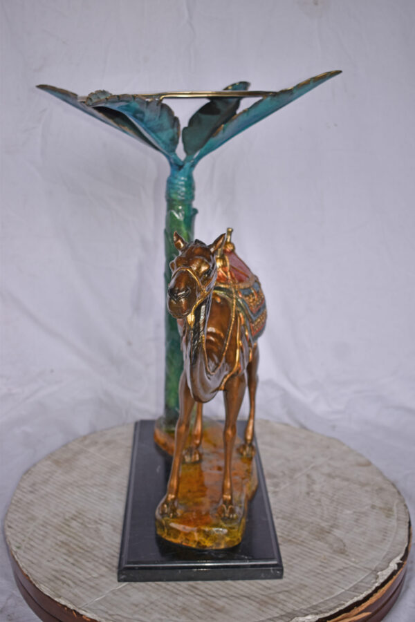 Camel Standing Under A Palm Tree Bronze Statue - Size: 20"L x 29"W x 25"H. - Image 10