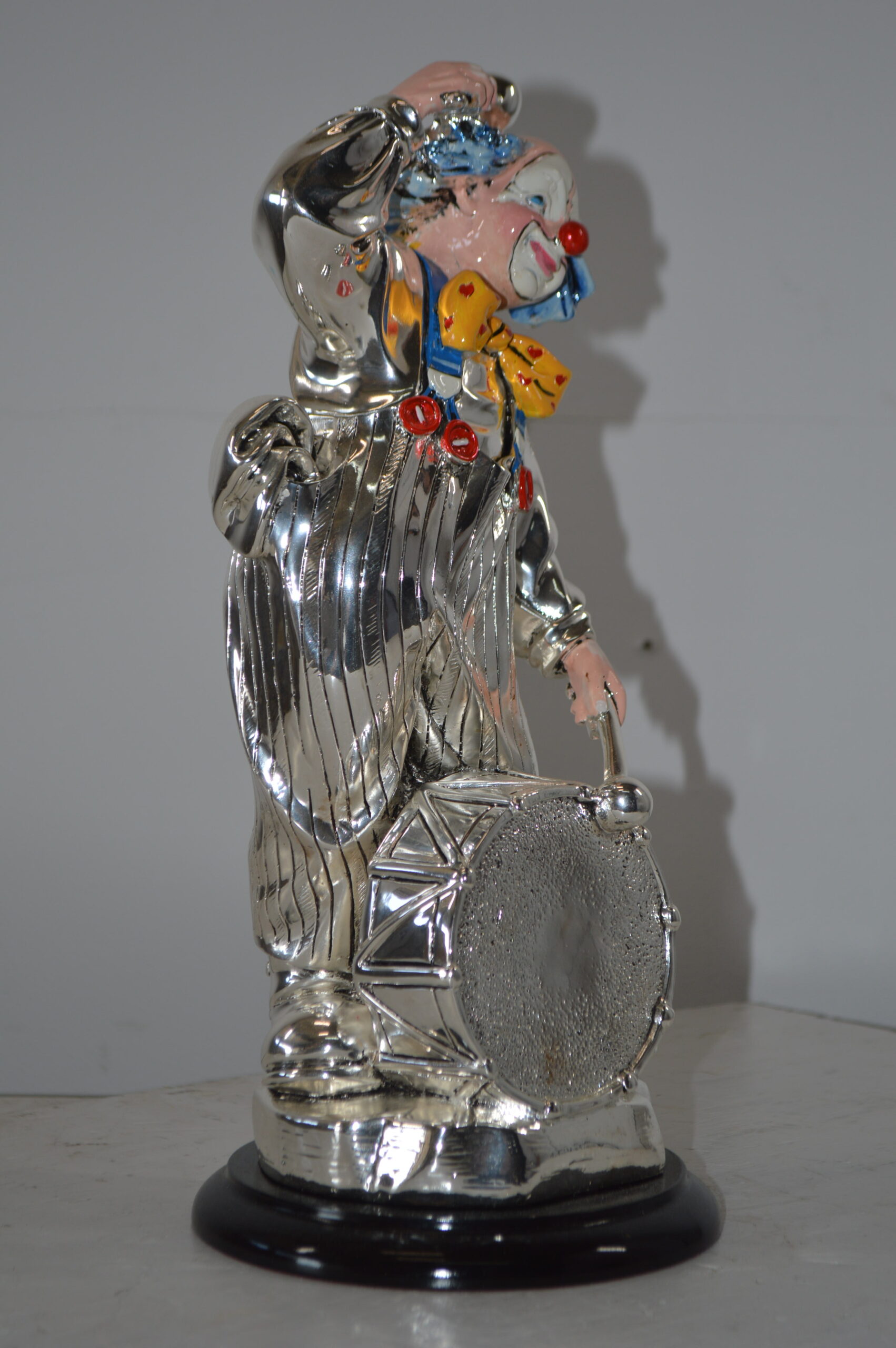 Clown Plays the Drams Resin Statue Silver finish - Size: 6L x 6W x 16H.