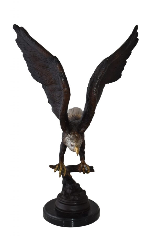 Eagle Holding His Fish Prey Flying Away Bronze Statue Size: 14" x 11" x 23"H