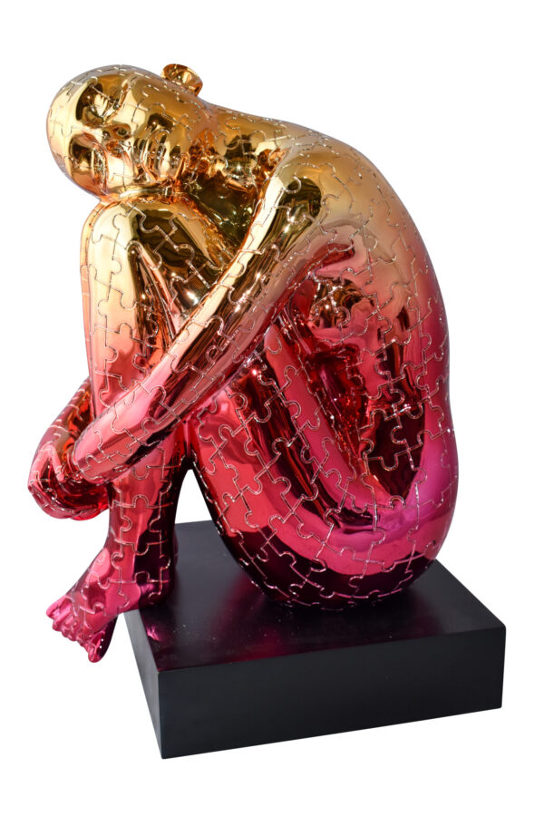 Puzzle Patterned Cradled Woman Resin Statue on Black Base Size: 13" x 12" x 19"H
