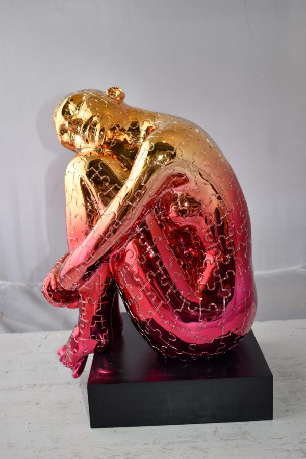 Puzzle Patterned Cradled Woman Resin Statue on Black Base Size: 13" x 12" x 19"H - Image 3