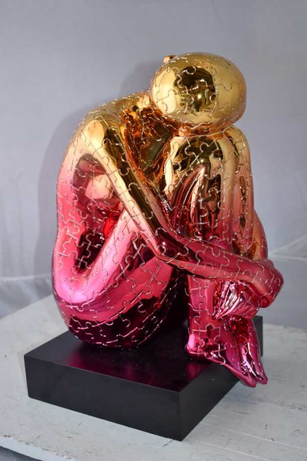 Puzzle Patterned Cradled Woman Resin Statue on Black Base Size: 13" x 12" x 19"H - Image 7