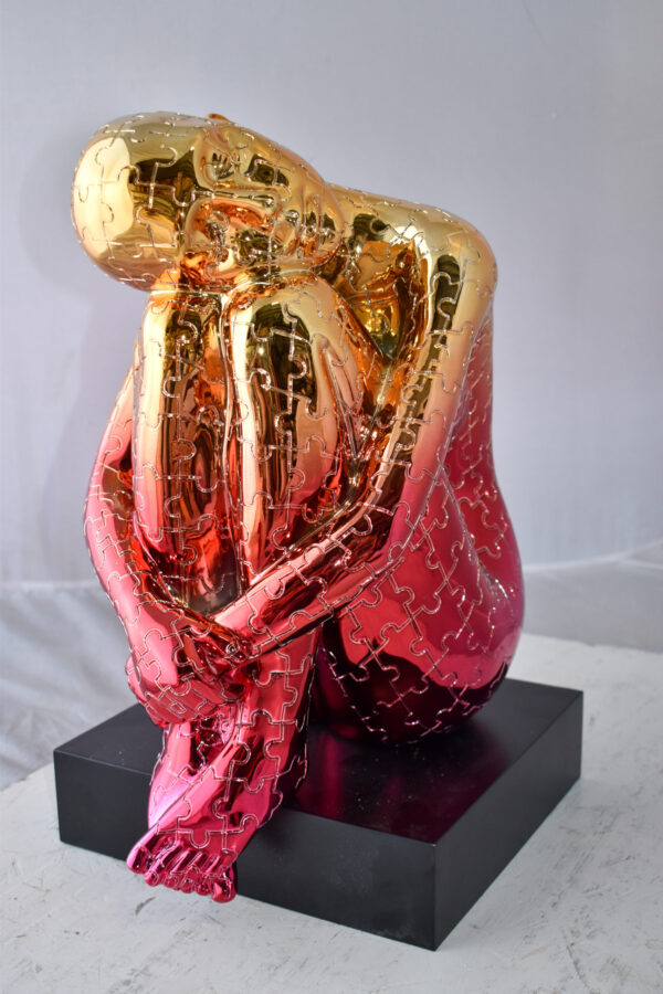 Puzzle Patterned Cradled Woman Resin Statue on Black Base Size: 13" x 12" x 19"H - Image 11