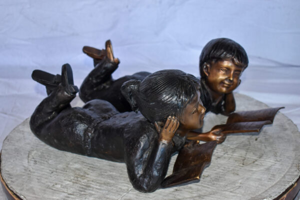 Young Kids Laying and Reading Cheerfully Bronze Statue Set Size: 20" x 13" x 8"H - Image 12