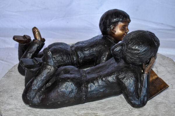 Young Kids Laying and Reading Cheerfully Bronze Statue Set Size: 20" x 13" x 8"H - Image 3