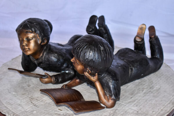 Young Kids Laying and Reading Cheerfully Bronze Statue Set Size: 20" x 13" x 8"H - Image 8