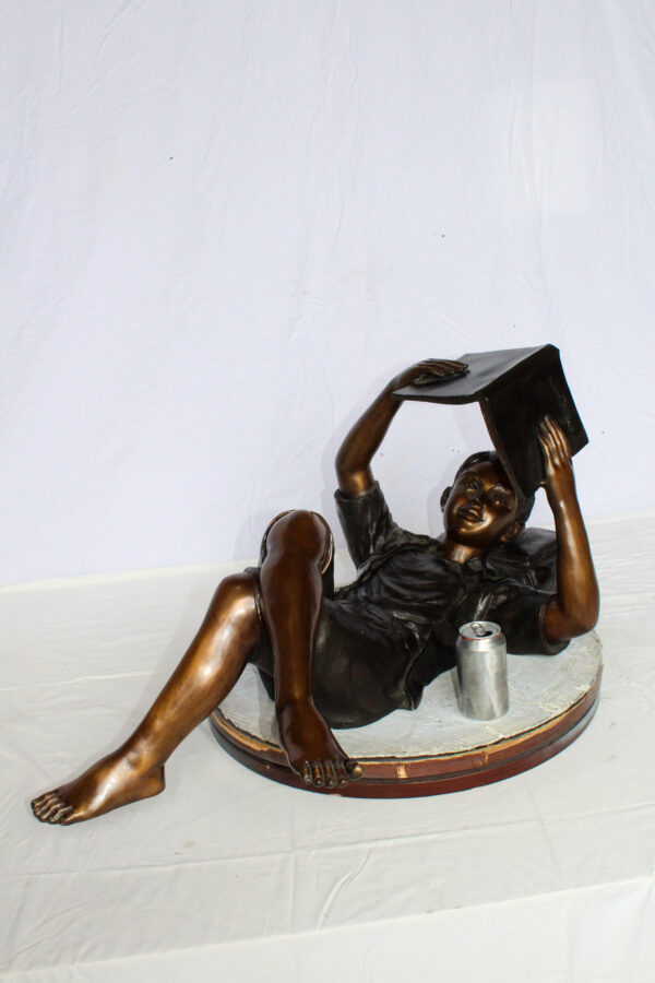 Boy Reading Bronze Statue with Book Raised Overhead 41" x 22" x 18"H - Image 2