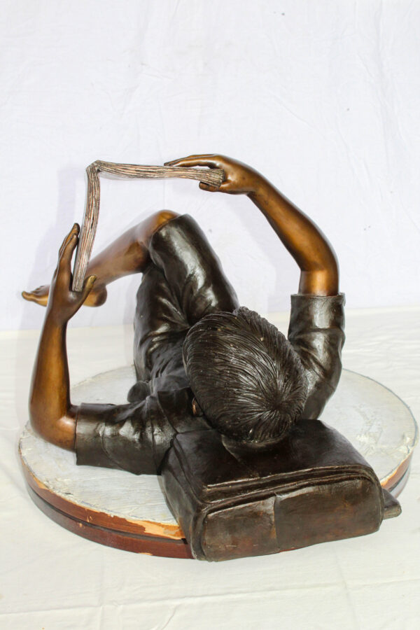 Boy Reading Bronze Statue with Book Raised Overhead 41" x 22" x 18"H - Image 5
