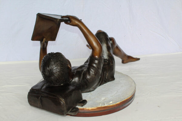 Boy Reading Bronze Statue with Book Raised Overhead 41" x 22" x 18"H - Image 6