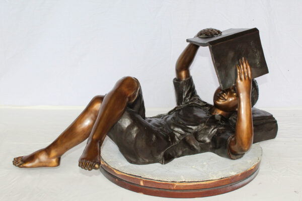 Boy Reading Bronze Statue with Book Raised Overhead 41" x 22" x 18"H - Image 11